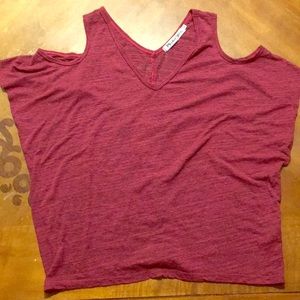 Red shirt shows shoulders